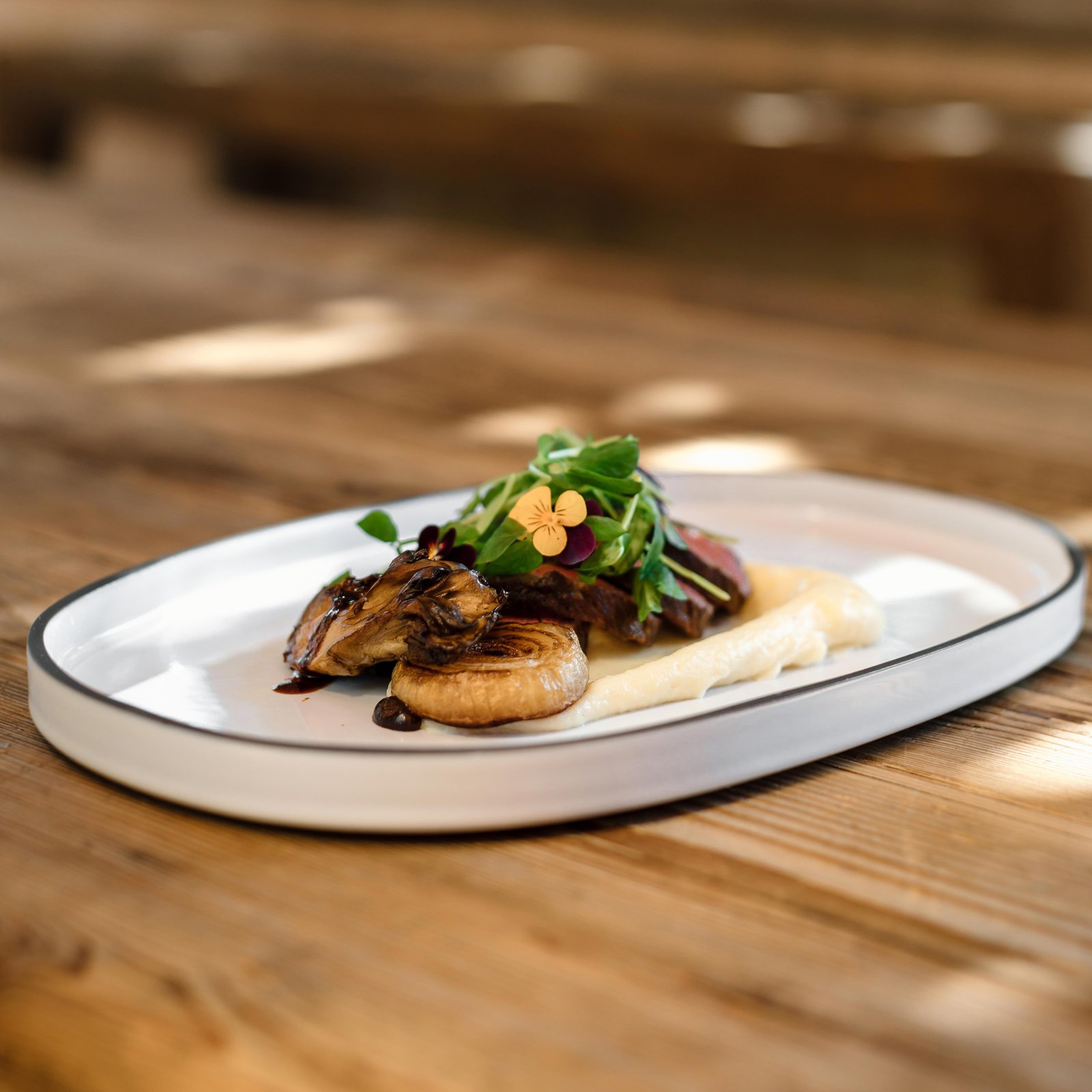a plate of food on an outdoor table